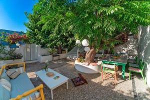 A garden outside Casa Angelina Lindian House with large garden