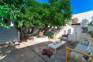A garden outside Casa Angelina Lindian House with large garden