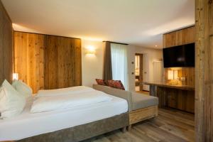 Postel nebo postele na pokoji v ubytování Hotel Pineta