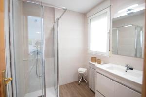 a bathroom with a shower and a sink at Luna Apartment by A3Rentals in Armilla