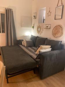 Coin salon dans l'établissement Maisonnette La petite Jeanne