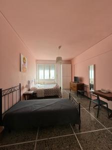 Postel nebo postele na pokoji v ubytování Amelì Room