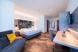 Postel nebo postele na pokoji v ubytování Arotel Best living Nürnberg + 28 fotografií