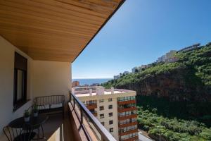 a balcony with a view of a building at Phoebe Apartment - city centre of Santa Cruz in Santa Cruz de la Palma