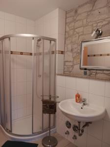 Ванна кімната в Gästehaus Am Hasenturm