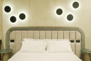 Postel nebo postele na pokoji v ubytování Comfort Suites