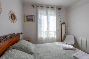 Postel nebo postele na pokoji v ubytování L'Echappée Bleue - Appt pour 4 Vue mer