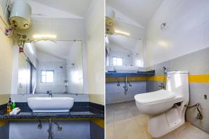 a bathroom with a sink and a toilet and a mirror at FabHotel Prime WS Beach Resort in Goa