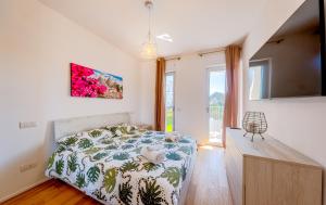 Postel nebo postele na pokoji v ubytování Vista Mare Polignano