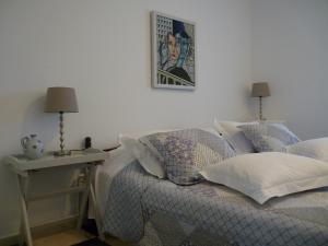 A bed or beds in a room at Seafront Villa Aggeliki