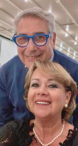 a man and a woman with glasses on a bus at B&B Mirella in Alberobello