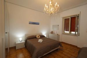 Ένα ή περισσότερα κρεβάτια σε δωμάτιο στο Vesuvio Guest House