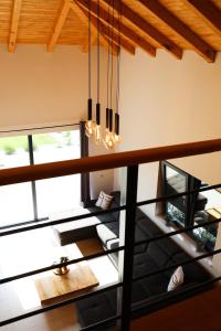 an overhead view of a living room with a chandelier at Vikendica Krcmarice- Banja Luka in Banja Luka