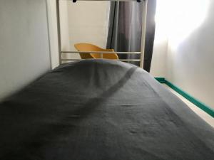 Cama ou camas em um quarto em My Hostel