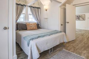 a bedroom with a bed and a window at The Mary Read - A Pirates Serenity in Christiansted
