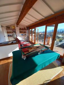 Istumisnurk majutusasutuses TERRAZZA COCCODE' spazioso con vista mozzafiato!