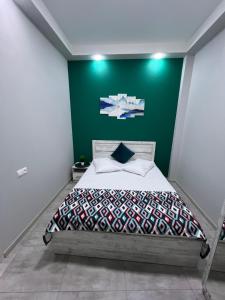 Postel nebo postele na pokoji v ubytování Cosy Apartment with Good Location Self Check In