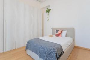 Posteľ alebo postele v izbe v ubytovaní Wine Not Apartment in Como City Centre