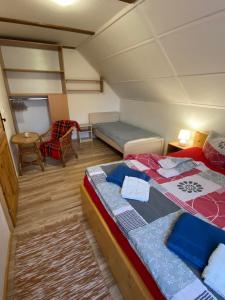 A bed or beds in a room at Privat Greta