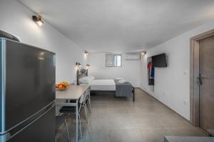 Postel nebo postele na pokoji v ubytování Michalis Home