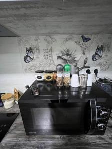 Kuchyň nebo kuchyňský kout v ubytování Cosy Apartment with Good Location Self Check In