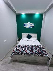 Postel nebo postele na pokoji v ubytování Cosy Apartment with Good Location Self Check In