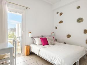 Postel nebo postele na pokoji v ubytování BayBees Sea View Residence