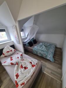 Posteľ alebo postele v izbe v ubytovaní Tom Apartmans