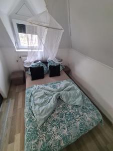 Posteľ alebo postele v izbe v ubytovaní Tom Apartmans