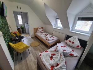 Posteľ alebo postele v izbe v ubytovaní Tom Apartmans