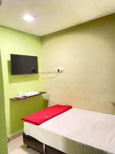 TV a/nebo společenská místnost v ubytování Hotel Rim Global Subang