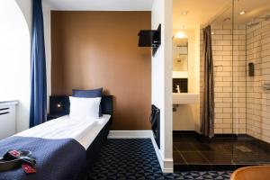 Krevet ili kreveti u jedinici u okviru objekta Milling Hotel Ritz Aarhus City