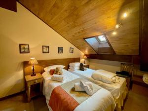 - 2 lits dans une chambre mansardée dans l'établissement 617 Manoir Savoie, à Arc 1950 19 autres photos