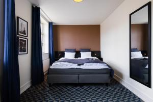 Krevet ili kreveti u jedinici u okviru objekta Milling Hotel Ritz Aarhus City