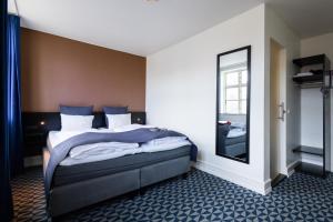 Krevet ili kreveti u jedinici u okviru objekta Milling Hotel Ritz Aarhus City