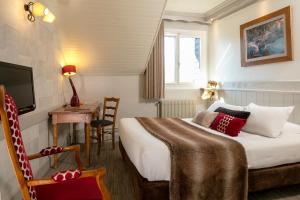 Posezení v ubytování Hôtel & Spa Les Bartavelles