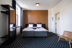 Krevet ili kreveti u jedinici u okviru objekta Milling Hotel Ritz Aarhus City