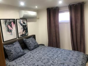 Säng eller sängar i ett rum på Appartement RDC dans une Villas