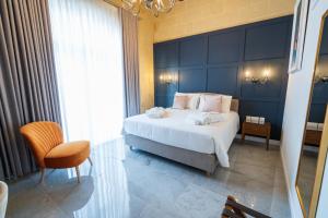 L-Eremita Boutique Hotel客房内的一张或多张床位