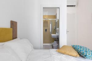 Letto o letti in una camera di Nimar Suite