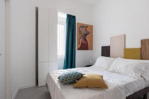 Letto o letti in una camera di Nimar Suite