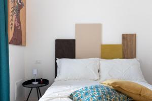 Letto o letti in una camera di Nimar Suite