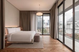 Ein Bett oder Betten in einem Zimmer der Unterkunft Else Kuala Lumpur