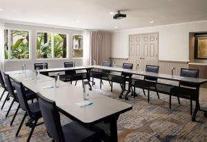 a conference room with tables and chairs and windows at Hyatt House San Diego Sorrento Mesa in Sorrento +49 photos
