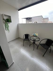 Balkón nebo terasa v ubytování Cosy Apartment with Good Location Self Check In