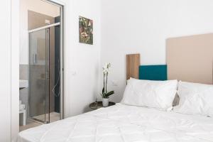 Letto o letti in una camera di Nimar Suite