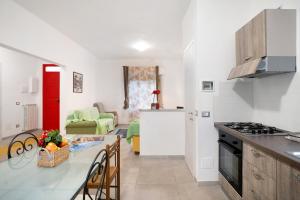Kuchyň nebo kuchyňský kout v ubytování Casa Rosy + 12 fotografií