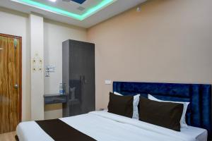Cama o camas de una habitación en OYO Hotel Krishna INN