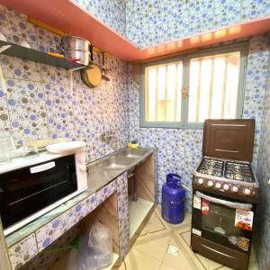 Küche/Küchenzeile in der Unterkunft Mini villa meublée pour vos séjours