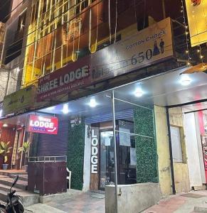 a store front of a building on a city street at Shree lodge in Dandeli